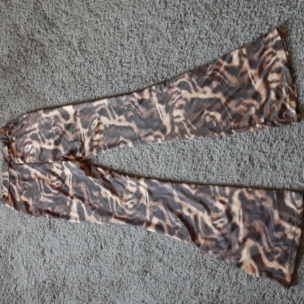 Silky flare stretchy pants.  Perfect condition 42" length